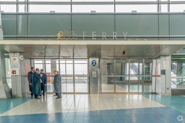 Residents ride the Staten Island Railway and transfer to the ferry to reach lower Manhattan.