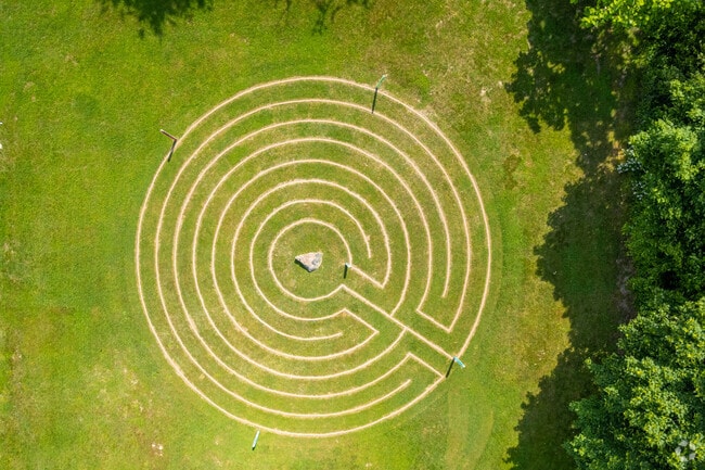 A stone labyrinth sits beside Williamstown Organic Community Garden.