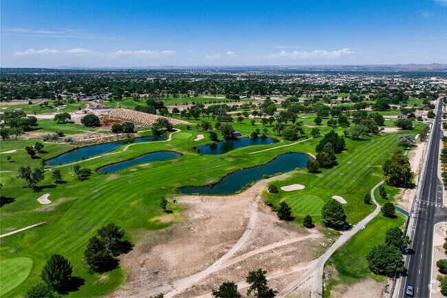 Golfers in Arroyo del Oso enjoy the neighborhood's beautiful golf course.