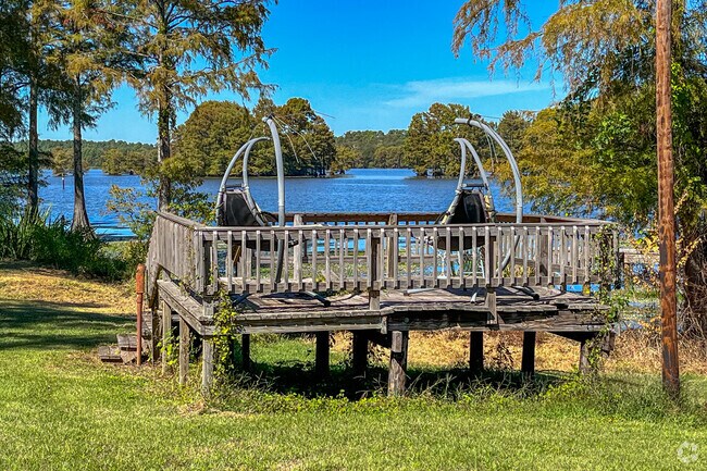 Here is a homeowners personal decking to stare at the lake in Mooringsport-Brian.