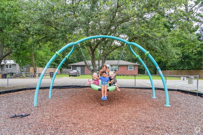Families play freely at Pearl River Park, where nature and community come together for a perfect day outdoors.
