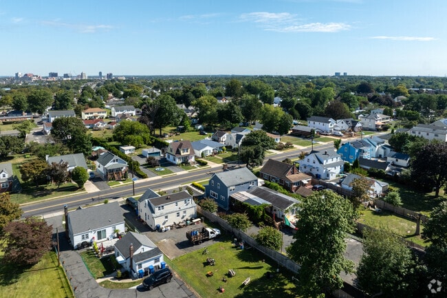 Tree-lined streets frame established South Brunswick neighborhoods.