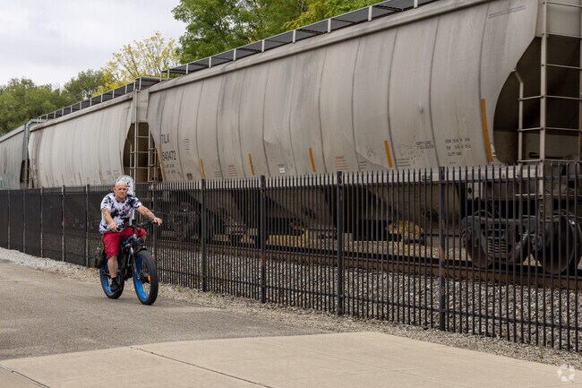 Cyclists enjoy the smooth, level trails of the Cardinal Greenway.