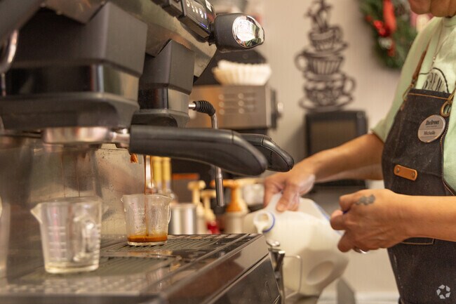She Brews Coffee on Will Rogers Boulevard serves espresso and lunch.