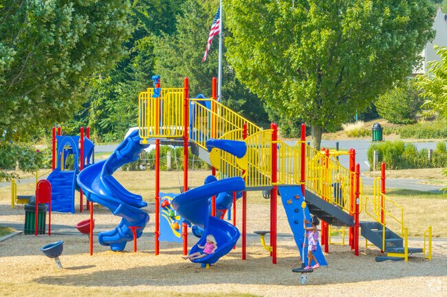 Kids enjoy the newly built and well maintained playground at Flory Park in Bridgeport.