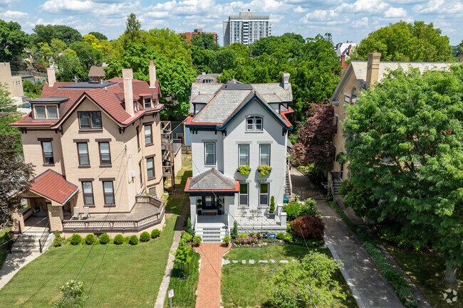 Homes in East Walnut Hills are typically two stories tall surrounded by trees.
