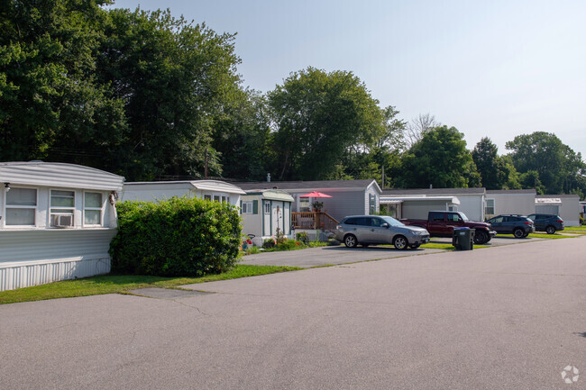 Some manufactured-homes are part of the fabric of community in Long Hill neighborhood.