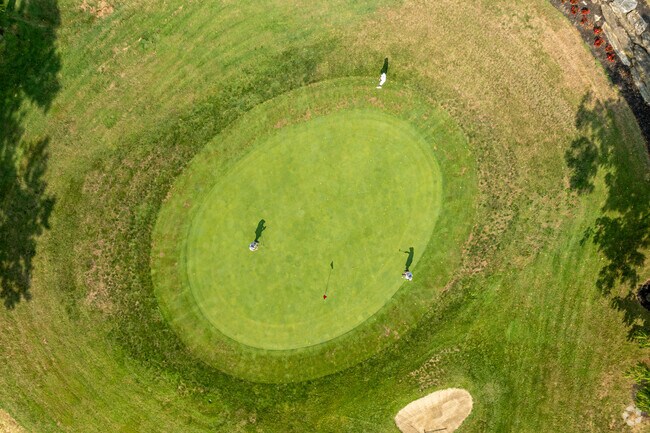 Three friends finish up their round at Willow Valley Golf Course in Lyndon.