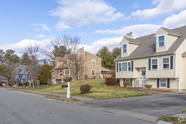 A row of Cape Cod inspired homes in the West End neighborhood of Methuen, MA.