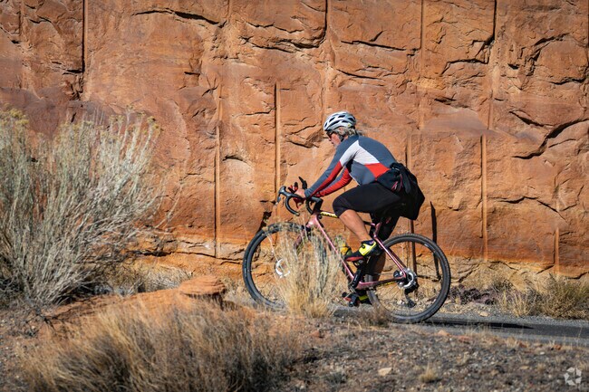 Fruita, Colorado, is a road biking paradise, with scenic routes weaving through the stunning Monument area, where cyclists can enjoy breathtaking views and exhilarating rides amidst nature's beauty.