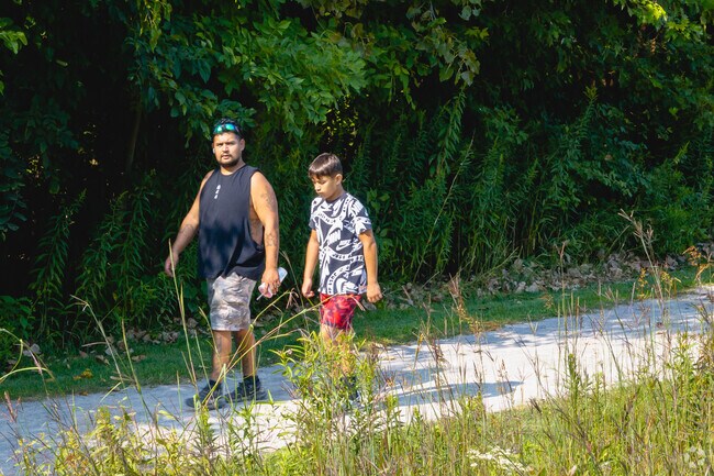 Walkers enjoy the long open trails at Ansted Park.
