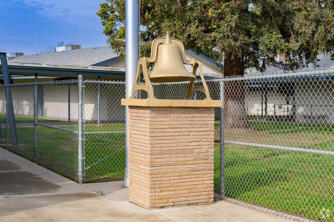 An old school bell greets students as they arrive at Snowden Elementary School.