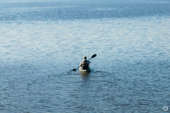Kayakers paddle out onto Long Lakes serene waters and fish for Pike, Trout, and Bass.