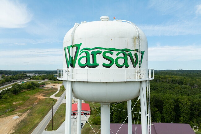 Warsaw water tower rises above the city skyline.