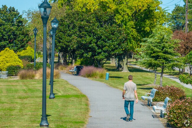 Broad Creek Park in Stonebridge/Middle Towne Arch has a paved trail that runs throughout.