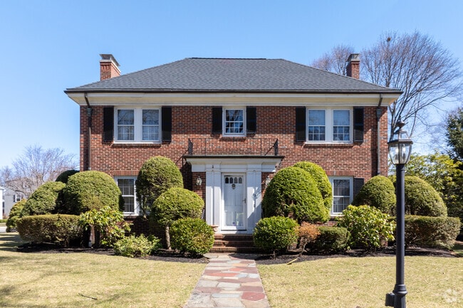 Manicured lawns and homes that sit back off the street can be found all throughout The Flats neighborhood.