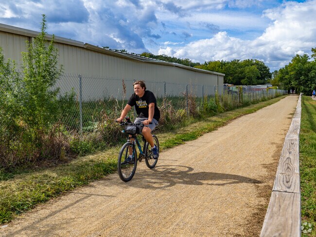 Linear Trail S Manhattan Ave Trailhead offer resident miles of Hiking and biking trials.
