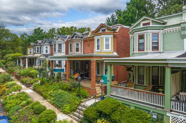 Brandywine Village has vibrant, colorful row homes with well-manicured landscaping.