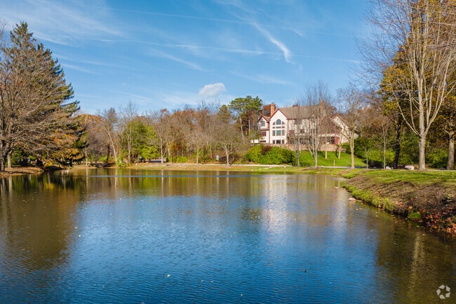 Trout Valley is a scenic neighborhood with large homes that peek through the treeline.