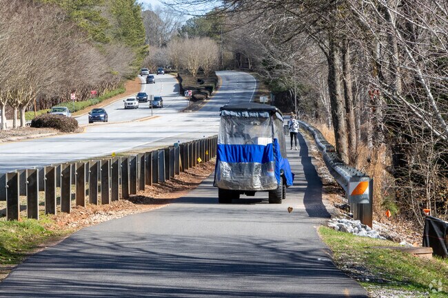 Georgia's golf cart community has miles of cart trails weaving throughout Peachtree City.