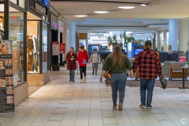 People walk and shop at the Meridian Mall in Okemos.