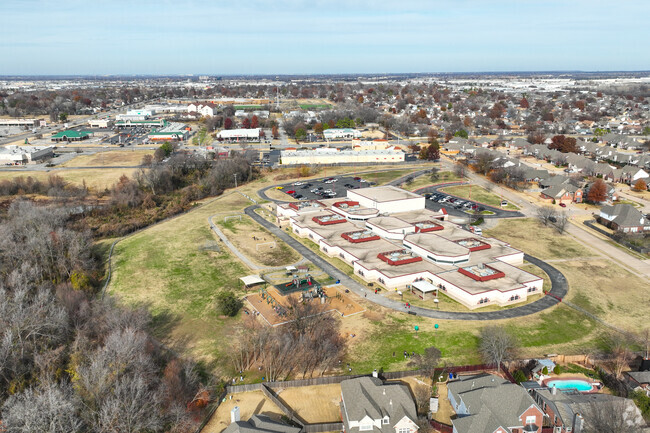Marshall T. Moore Elementary School has multiple playgrounds and walking paths for kids to play.
