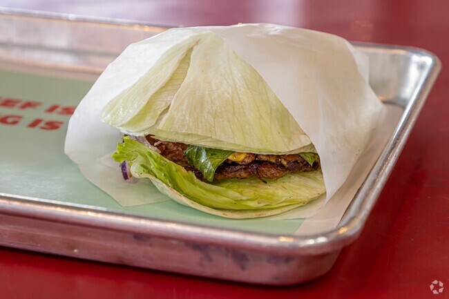 Healthy options, like a lettuce wrap, are available at Atomic Burger in New Metairie North.