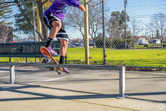 A skater at Charles Robertson Park shreds on the rails in Strawberry Manor.