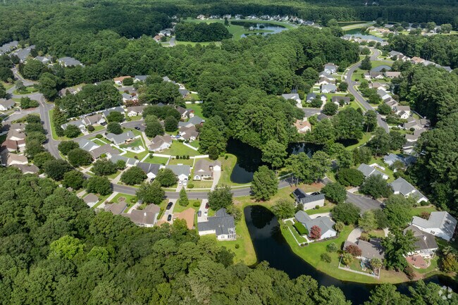 The winding streets and ponds make Woodbridge feel like a small rural community.
