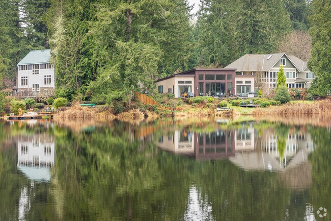 Lakefront homes in Lake Marcel can range in style, though all enjoy serene views.