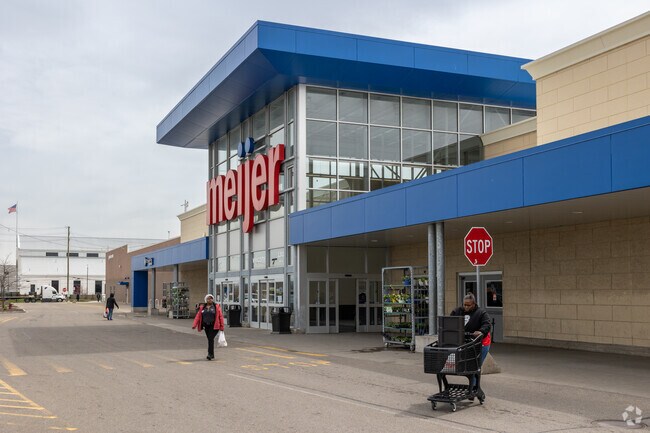 Big box grocers like Meijer are just down the street from Palmer Woods.