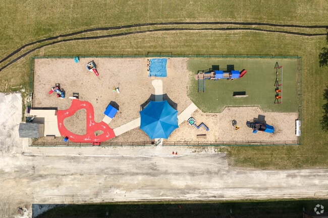 Woodland Elementary School in Gages Lake, Illinois includes multiple playgrounds.