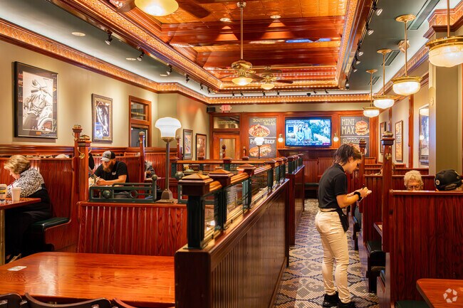 Customers from Downtown Massillon enjoy dinner in a warm atmosphere at Rockne's Restaurant.