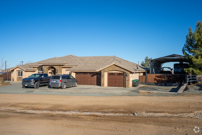 Live large in Phelan with a ranch home featuring ample RV and boat parking.