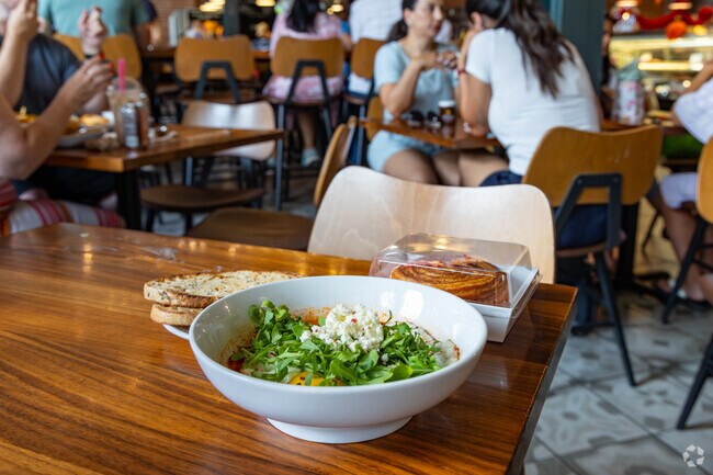 Have lunch and a viral croissant from Izzo Bakery at the Denver Central Market in River North.