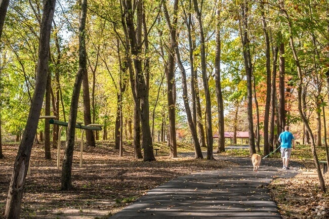Tree lined walking paths are found at Minnie Ha Ha Park in Sunset Hills, MO.