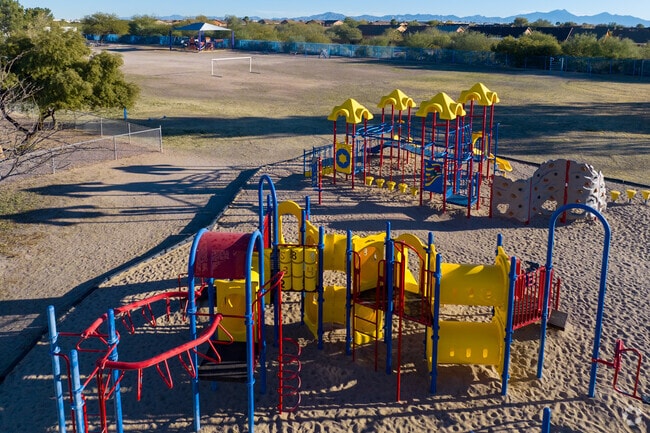 Kids love the new playground equipment at Los Amigos Elementary School in Tucson, AZ