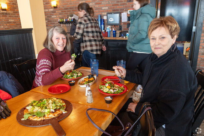 Friends gather for lunch at Portland Pie Company near North Gorham.