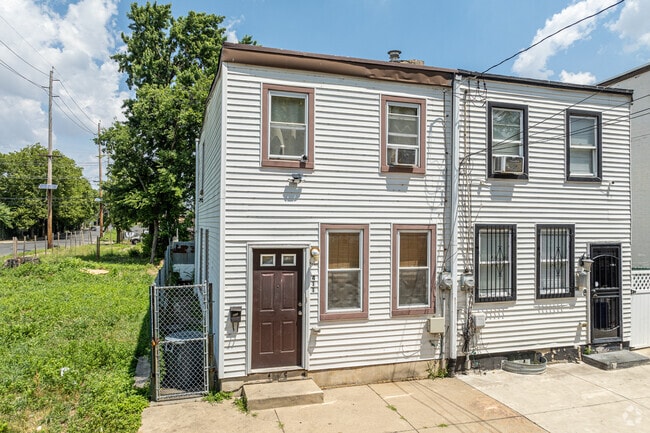 Some Waterfront South homeowners choose to clad their rowhomes in siding.
