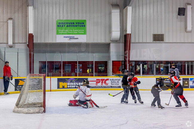 Local kids can participate in hockey leagues at Optimist Arena north of Bennett.