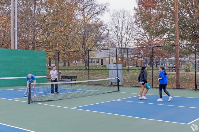 Summit residents enjoying a game of pickleball, in nearby Winslow, on a beautiful day.