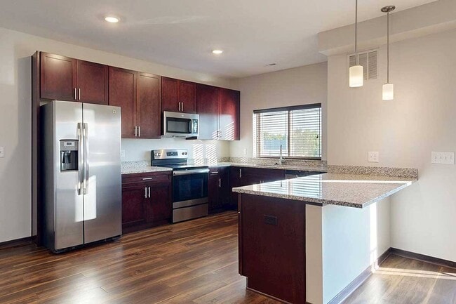 Whip up your favorites in a modern kitchen with ample counter space and stainless steel appliances.
