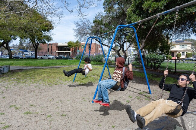 The swing set at Mosswood Park is enjoyed by all ages of local youth.