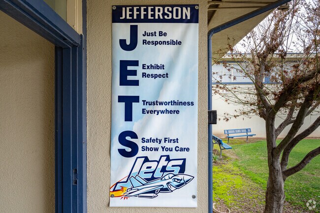 A poster at the entrance to Jefferson Elementary School reminds students of good behavior.