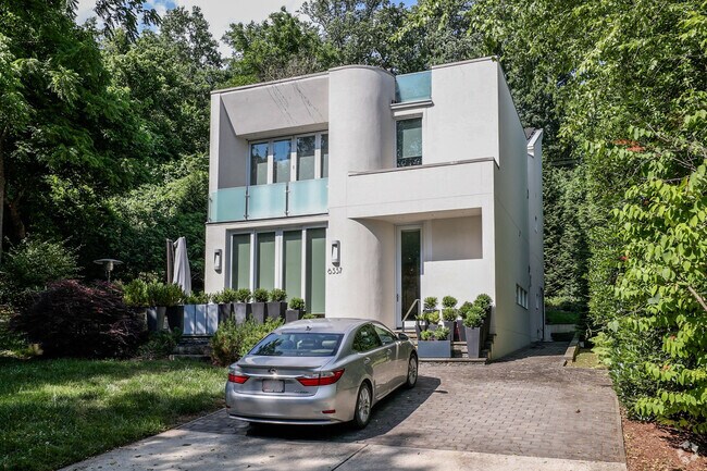 Experience architectural brilliance in a modernist creation nestled in Brookmont.