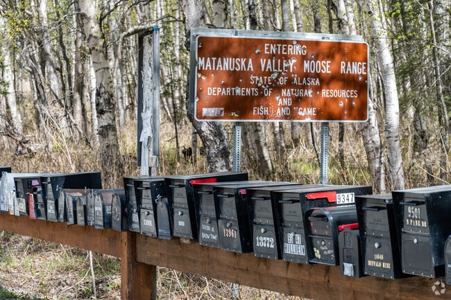 Buffalo Soapstone neighbors include moose which are considered a bit of a menace, hence the target practice on this sign.