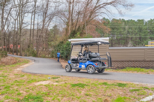 Residents in Peachtree City tend to get around the neighborhood via golf cart on paved pathways.