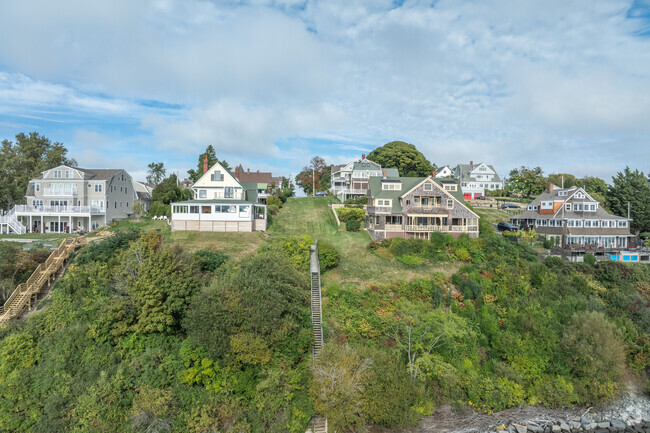 A row of homes in Telegraph Hill sits on a bluff overlooking Hull Bay.