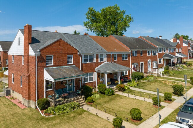 Most streets in Lock Raven are lined on both sides with 2 story brick row homes.