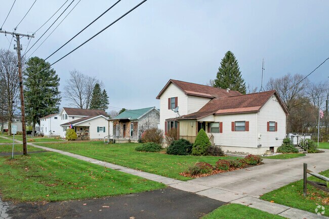 Homes of differing shapes and sizes represent Concord.